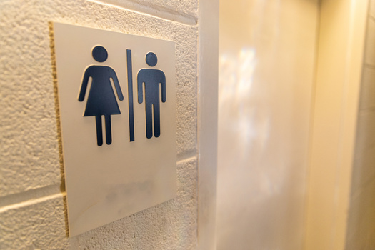 Fourteen states prohibit transgender people from using the restroom consistent with their gender identity, according to Human Rights Campaign. (Chad Robertson/Adobe Stock)