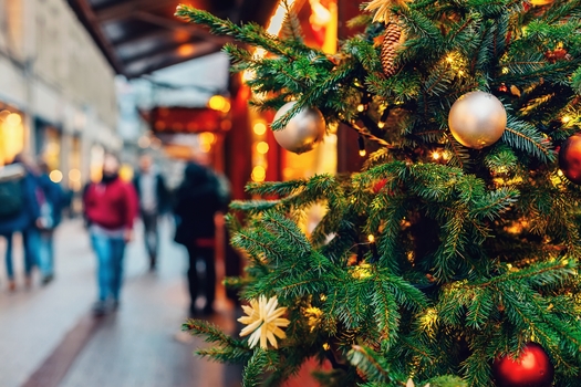 According to the National Retail Federation, American consumers spend an average of $902 on gifts and other holiday items each Christmas. (Adobe Stock)