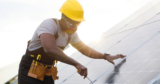 The Massachusetts climate law creates a new Office of Environmental Justice and Equity to help communities play an active role in the accelerated siting and permitting process for clean energy projects, and provides funds to help those communities with legal representation. (Adobe Stock)