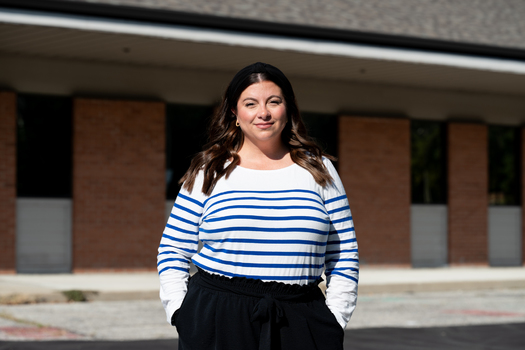 Elizabeth Friedland, founder of Safe Park Indy, poses for a portrait at the first lot she secured. (Mirror Indy)