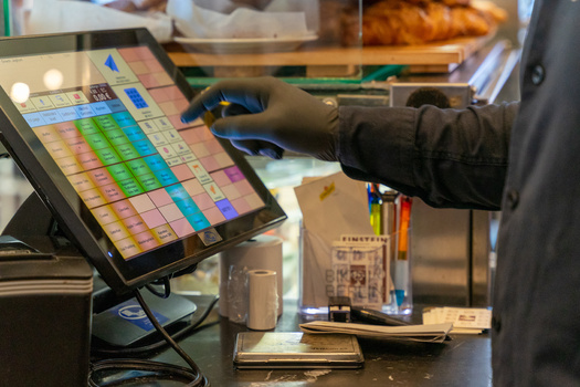 According to the National Center for Education Statistics, 40% of full-time undergraduate students and 74% of part-time undergraduates were employed while enrolled, with many working over 20 hours per week to cover living expenses. (jaz_online/Adobe Stock)