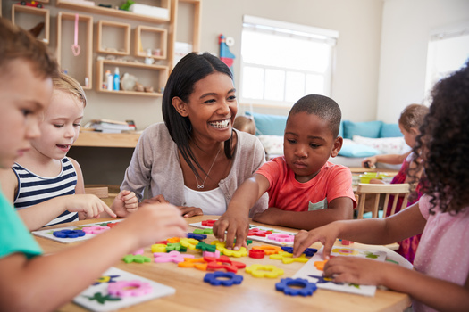 Millions of families across the U.S. depend on home-based child care, with over 750,000 children enrolled in these programs, often because parents consider them more flexible than traditional child care centers. (Adobe Stock) 