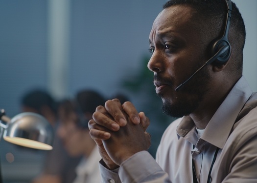 Job stress and poor pay are causing a high turnover rate for counselors at crisis centers handling calls for help from suicidal individuals, according to a report from the National Alliance on Mental Health. (Adobe Stock)