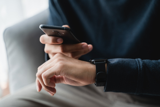 Companies are increasingly providing apps and other tools for people to track their screen time with the hope of cutting back. But a Minnesota exert says those solutions are still reliant on technology, making the temptation too hard for many people. (Adobe Stock)