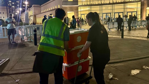 Pacience Edwards, a Direct Relief pharmacy specialist, delivers essential medications to the Pasadena Convention Center on Jan. 9. (Direct Relief)