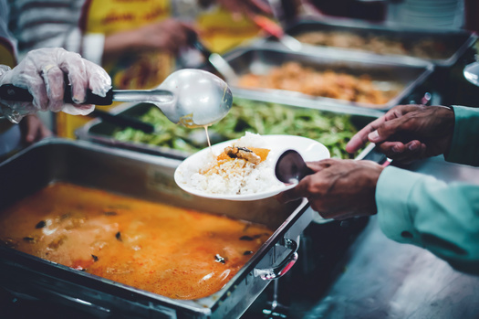 Extreme weather reduces volunteer numbers, increasing challenges for shelters. Volunteers saved the St. Louis Loaves and Fishes shelter $65,000 in overhead costs last year. (kuarmungadd/Adobe/Stock)