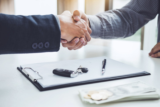 A new federal report finds U.S. service members, when buying cars, are less likely to make a downpayment, more likely to make a smaller downpayment, and more likely to make a negative equity trade-in than civilian buyers. (Freedomz/Adobe Stock)