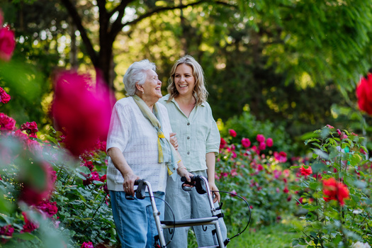 Family caregivers on average are spending 26% of their income on caregiving activities, according to a 2021 AARP survey. (Adobe Stock)