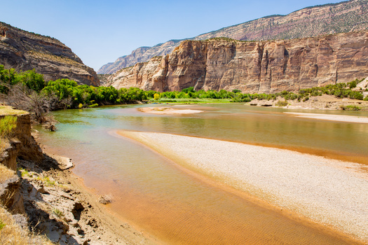 Advocates for public lands warn that even drilling on lands adjacent to such places as Dinosaur National Monument in Colorado and Utah can lead to industrial contamination of shared waterways. (Adobe Stock)