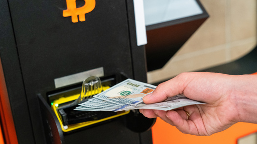 Cryptocurrency kiosks can pop up in common spaces such as gas stations but fraud experts said because the industry is largely unregulated, it is hard for the victim of a scam to get their money back after it is deposited. (Adobe Stock)