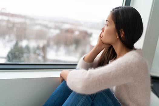 In a recent study, women were more likely than men to say their mood declines during the wintertime. (Adobe Stock) 