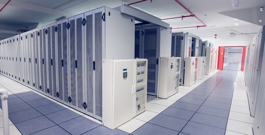 Data centers and the computer servers they hold can take up several hundred thousand square feet of property. (Adobe Stock)