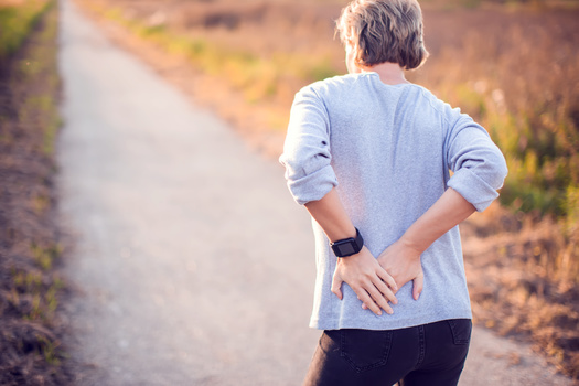 Chronic pain costs Americans billions of dollars in missed work and loss of productivity. (Adobe Stock)