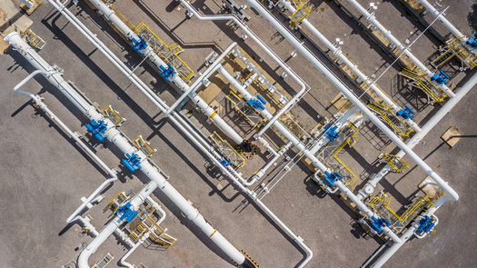 Utilities across the U.S. are tasked with meeting various carbon-reduction goals, and with electricity demand soaring, they said natural gas has to be part of the solution, at least temporarily. Clean energy advocates suggested it is not necessary. (Adobe Stock) 