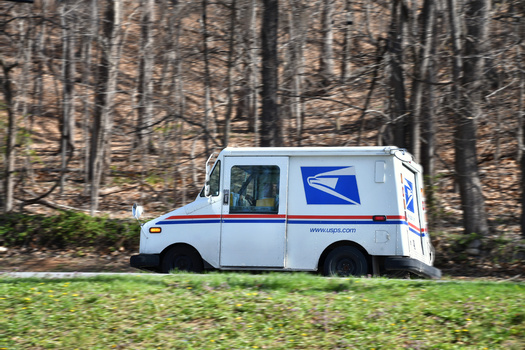 Rural residents depend on the U.S. Postal Service for deliveries of medications, bills and other critical items. Service reductions could hinder access to necessities. (MargJohnsonVA/Adobe Stock)