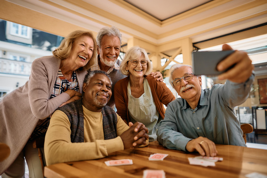 In a new AARP survey, 37% of older adults with credit card debt report their debt level is higher now than it was a year ago. (Adobe Stock)