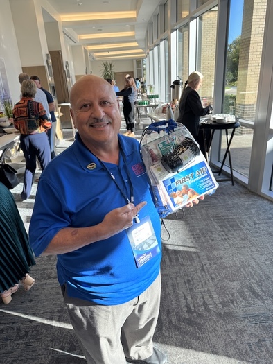 Eliseo Santana, the Gulf Coast Region manager for the Alianza Center, which serves the Puerto Rican and Hispanic communities, showcased the first-aid kits they distribute after hurricanes. (Trimmel Gomes)