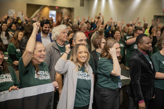 People from across Oregon rally together before speaking with legislators. Research shows that during a slowing economy, 1-billion dollars in new SNAP benefits would lead to an increase of 1.54-  billion dollars in GDP. (Oregon Food Bank)
