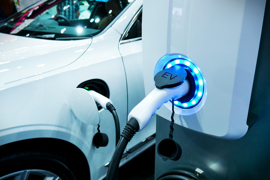 The states of Vermont and New York have already passed bills promoting virtual power plant programs that can redirect energy stored in devices like parked electric vehicles. (Buffaloboy/Adobe Stock)