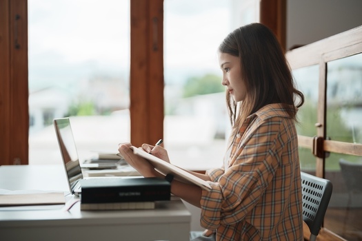 For the first time, more American college students will be learning entirely online than will be learning 100% in person, according to the consulting firm Encoura. (Adobe Stock)