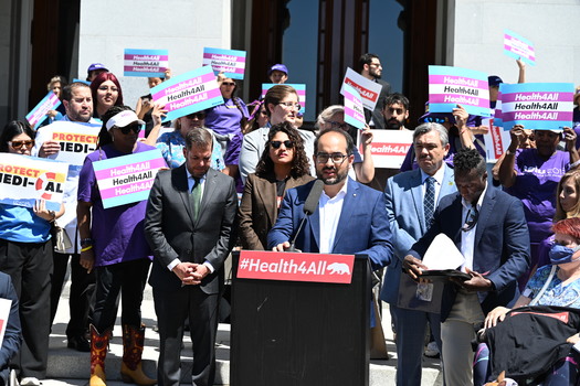 More than 50 protesters rallied on the steps of the Capitol Building in Sacramento to fight proposed cuts to Medi-Cal, which would affect more than 350,000 undocumented Californians. (California Immigrant Policy Center)