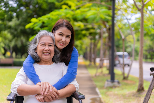 Nearly 70% of working caregivers in Ohio struggle to balance job duties and family responsibilities, according to AARP. (Adobe Stock)