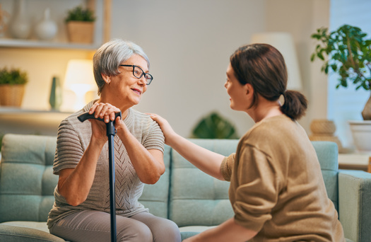Iowans with Alzheimer's disease or other forms of dementia are often cared for by unpaid family members or friends. (Adobe Stock) 