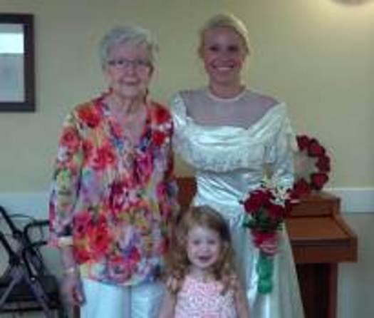 PHOTO: Maple Creek resident with daughter modeling her wedding dress.  Credit: Lutheran Social Services of Michigan
