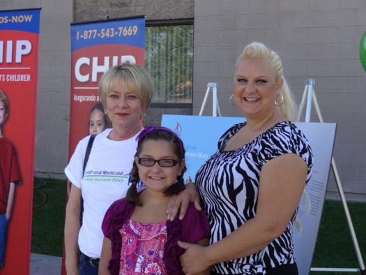 Joy Pizzuto (R) and her daughter Annabella agreed to be part of the story collection. They are seen  here with Karen Crompton (L), president and CEO, Voices for Utah Children.