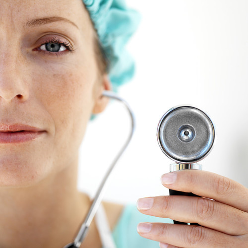 PHOTO: Female doctor with stethoscope. 