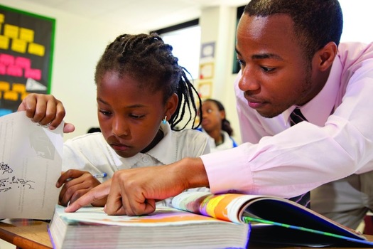 PHOTO: teacher helping a student, courtesy of Teach for America Eastern Carolina