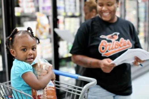 PHOTO: Mother shopping with child. Courtesy of Share Our Strength