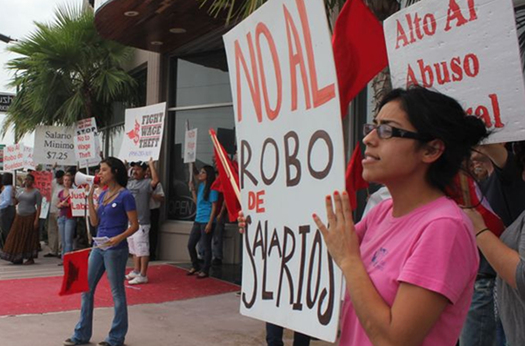 PHOTO: Protestors at Zuzhi Restaurant Bar in McAllen claim owners owe wages to former employees (7/11/2012). Photo credit: Fuerza del Valle Workers Center