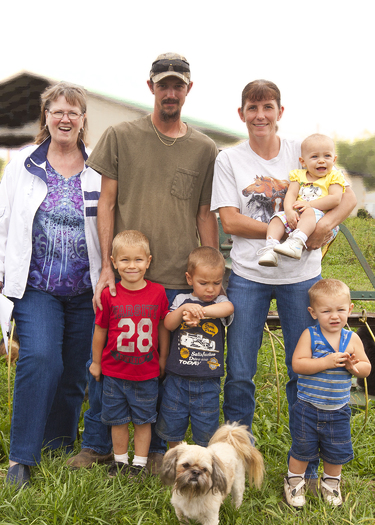 PHOTO: Picture of Bell with Rouch family. Courtesy Clark County Job and Family Services.