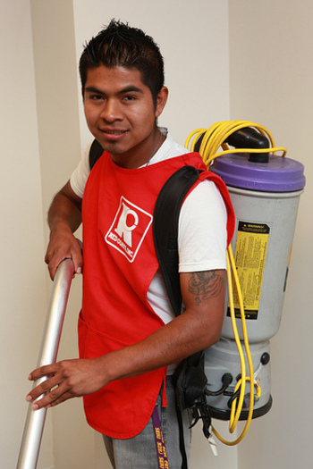 PHOTO: A contract office-cleaning crew member. Courtesy of 32BJ SEIU.