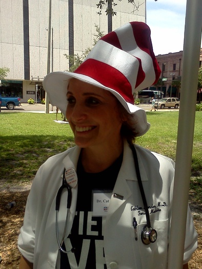 PHOTO: Dr. Cathleen London in the Doctor Seuss hat she sometimes wears when treating young patients. Photo by Dan Heyman.