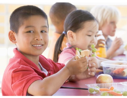 Photo: children eating at school program   Courtesy of frac.org