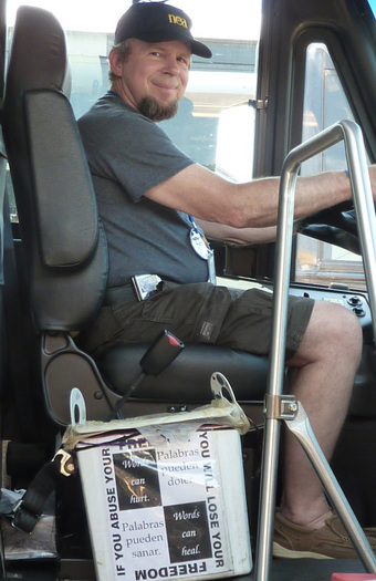 PHOTO: Bus driver Ric Clark at the wheel.