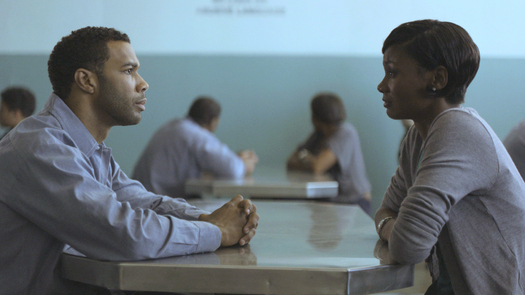 PHOTO: Derek (Omari Hardwick) is visited in prison by his wife Ruby (Emayatzy Corinealdi) in Middle of Nowhere.  Courtesy African American Film Festival Releasing Movement