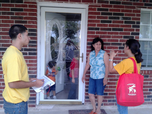 LUPE canvassers speak to infrequent voter in Mercedes in September. Credit: Daniel Diaz