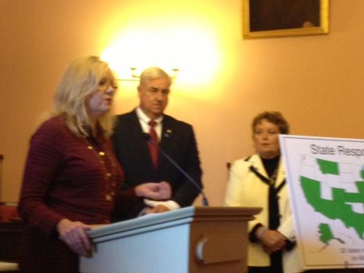 PHOTO: Picture of Marla Root at a Statehouse conference introducing the new legislation.