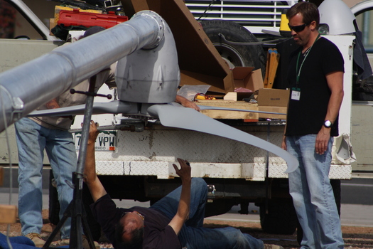 PHOTO: Students from Colorado School District 51 participate in the installation of a wind turbine at the district career center in Summer 2012. Courtesy Christy McGee.