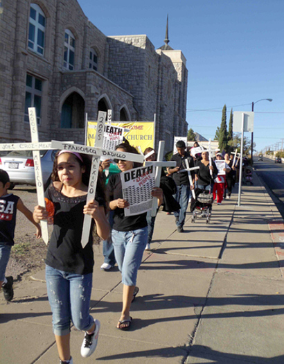 PHOTO: Da de los Muertos march in El Paso honoring Mexicans who died trying to emigrate (November, 2011). Credit: Cristina Parker.