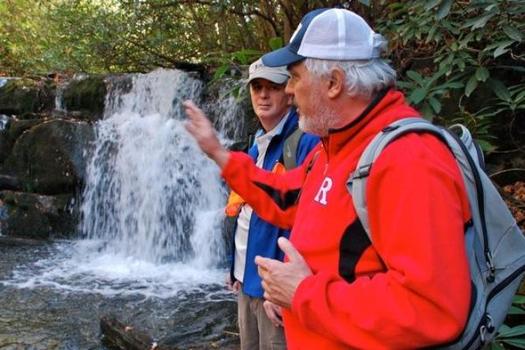 Jeff Hunter shows a stunning waterfall to writer Chris Dortch in the Cherokee National Forest (Photo: Jeff Guenther)