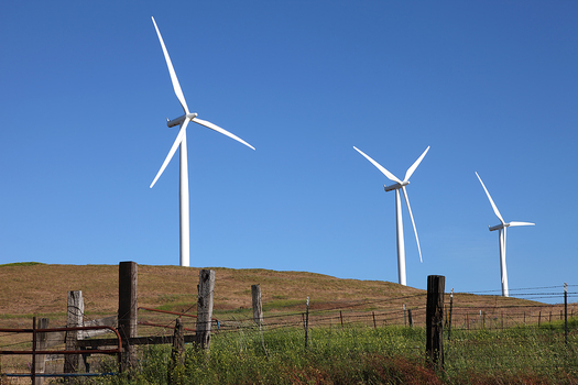 PHOTO: Love 'em or hate 'em, wind turbines are here to stay in the rural West. A new bill in Congress would require competitive bids from developers to lease public land for wind and solar projects. Courtesy of TheGorge.com