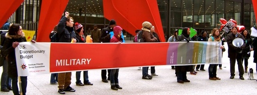 Chicago protesters compare military spending to domestic spending. Courtesy of American Friends Service Committee.