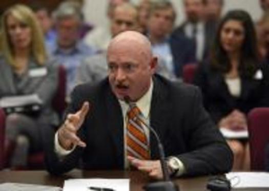 PHOTO: Mark Kelly, husband of former Arizona U.S. Rep. Gabby Giffords, testifies in favor of background checks for private gun sales Monday before a Colorado Senate committee. CREDIT: Denver Post.
