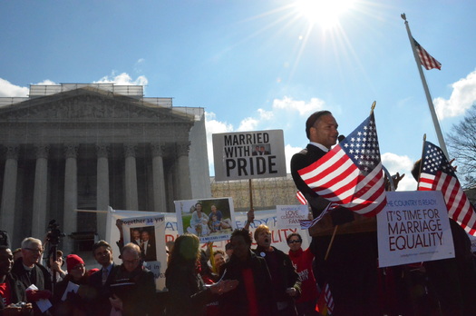 Photo: Baltimore Ravens linebacker Brendan Ayanbadejo joins a marriage equality rally at U.S. Supreme Court. Courtesy of Jamie McGonnigal, EqualityPhotography.com.