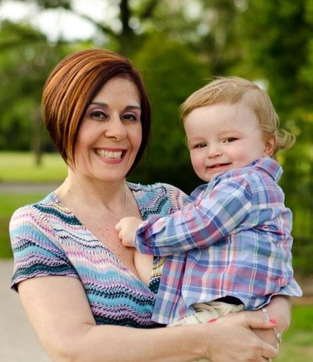 PHOTO: Caroline Edgerton is among dozens of people receiving financial assistance from HelpUsAdopt.org. The grant enabled her to adopt Logan. Courtesy HelpUsAdopt.org