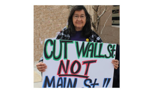 PHOTO: Sally Gallosa participated with other retirees and members of labor and environmental groups, protesting sequestration cuts in the public and private sector at a time when the New Mexico economy is weak. Courtesy: Miles Conway, Communications AFSCME Council 18.